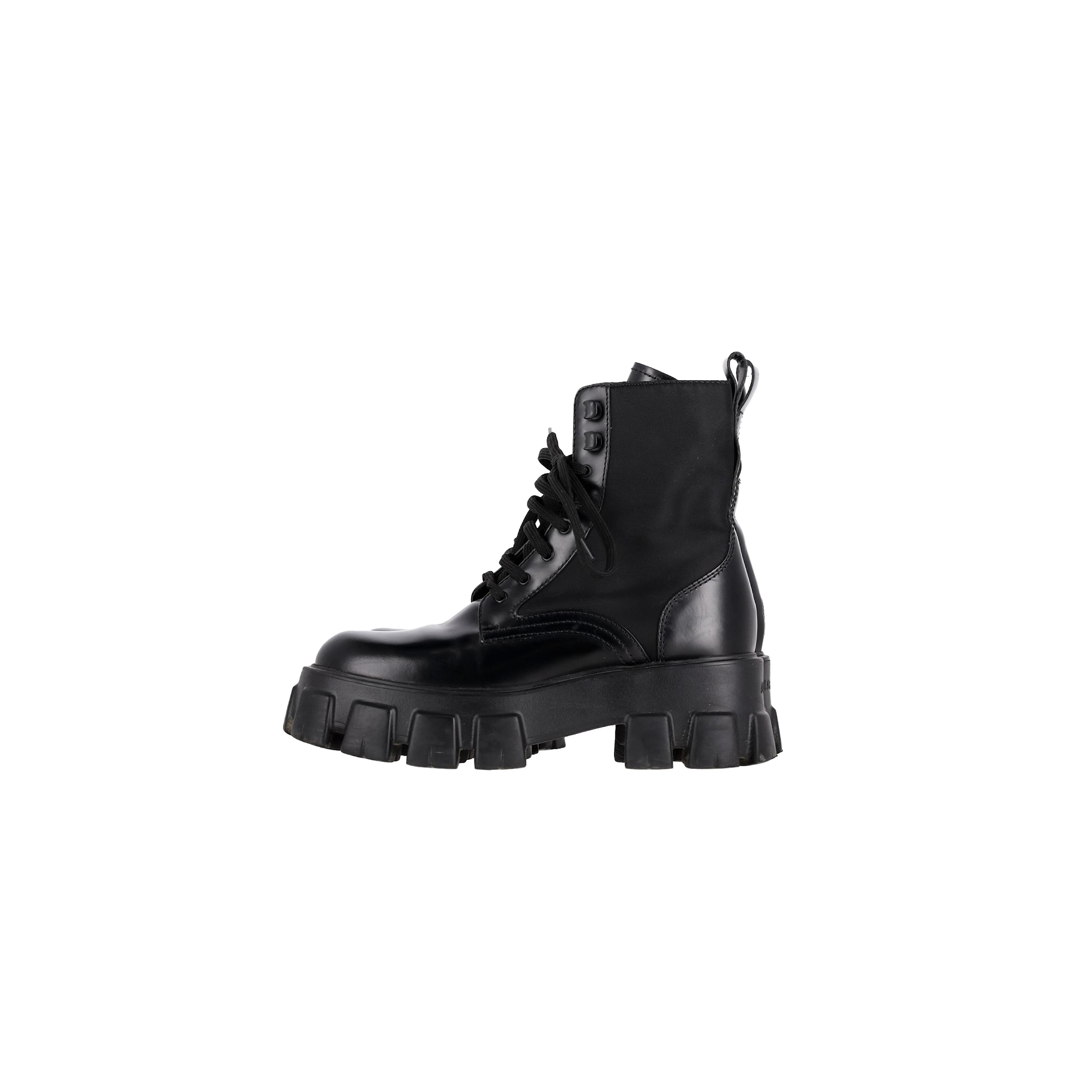 PRADA MONOLITH COMBAT BOOTS IN BLACK LEATHER 